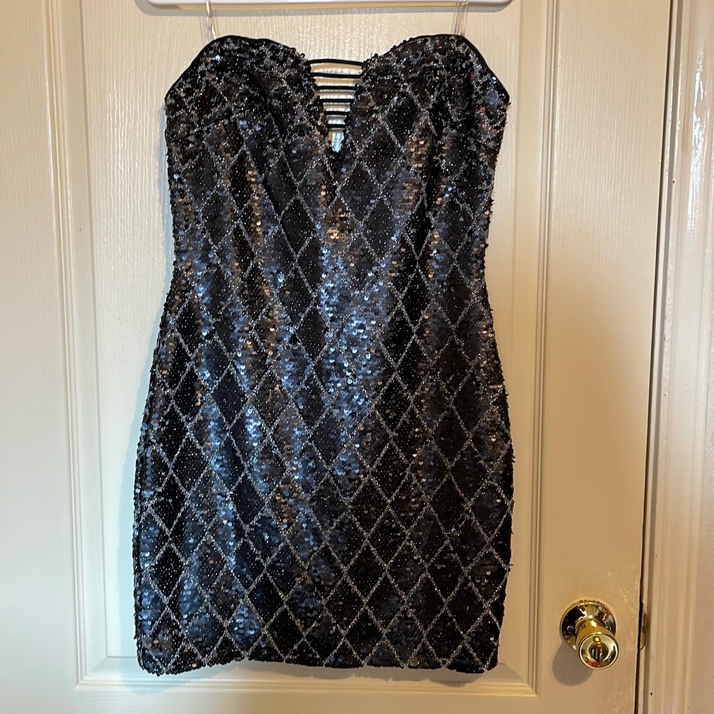 Black sequin strapless mini dress